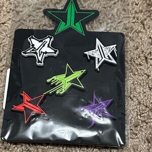 Jeffree Star set of Star Shaped Jibbitz in Green, Red, Purple, and White